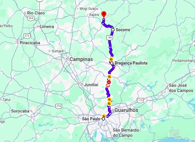 Mapa rodoviário destacando o trajeto para o Circuito das Águas Paulista via Rodovia Fernão Dias (BR-381). A rota parte de São Paulo, passando por Guarulhos, Bragança Paulista e Socorro até o destino final, que neste caso é Águas de Lindóia, com ícones indicativos de tráfego e sinalização da rodovia 146.